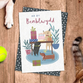 Ar dy Benblwydd (On your birthday) Dogs around table
